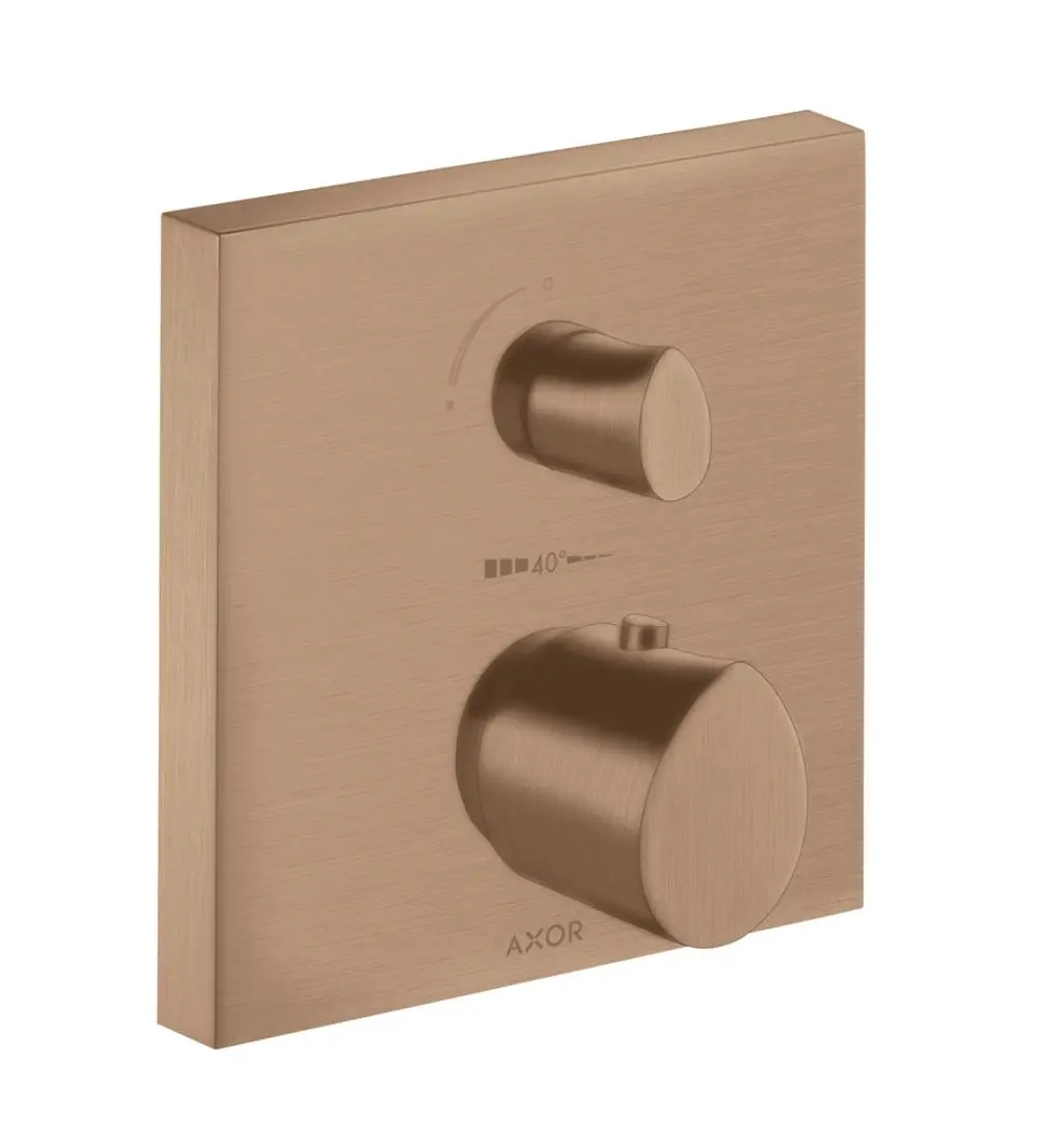 Thermostat mit Ab- und Umstellventil in gebürstetem Rotgold, montiert auf einer quadratischen Platte. Die Marke AXOR ist sichtbar.